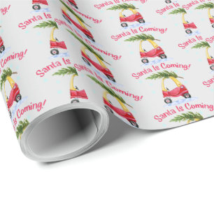 De Kerstman komt uit de Kinder kerstboom, de rode  Cadeaupapier