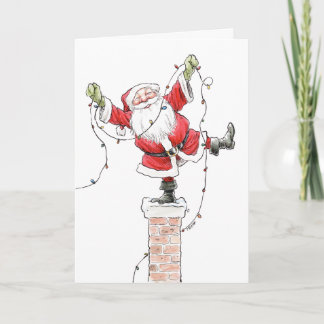 De kerstman met Kerstmis steekt Kaart aan