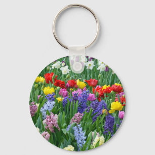 De kleurrijke tuin van de de lentebloem sleutelhanger