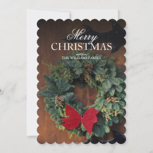 De kroon van Kerstmis op houten deur Feestdagenkaart