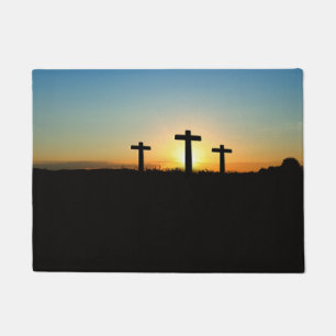 De kruisingen van de kroonkalk bij zonsondergang deurmat