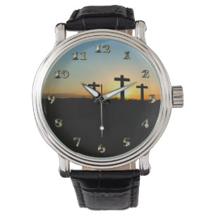 De kruisingen van de kroonkalk bij zonsondergang horloge