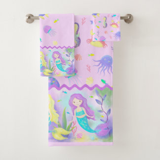 De mignonnes sirènes sous le néon marin