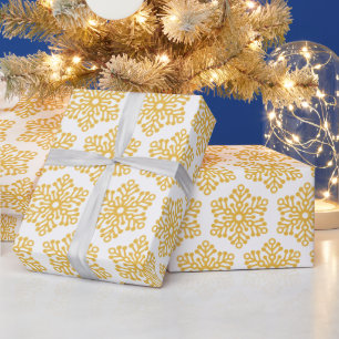 De mooie gele omslag van de de sneeuwvlokkengift cadeaupapier