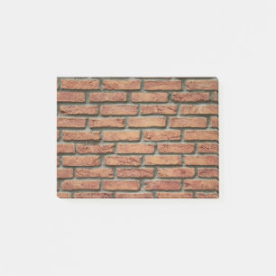 De muur rode stenen post-it® notes