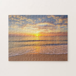 De ochtendzon in het zeegebied legpuzzel