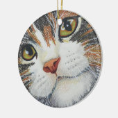 De ogen hebben het keramisch ornament (Links)