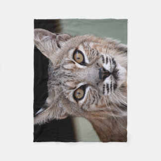 De ogen van een Bobcat Fleece Deken