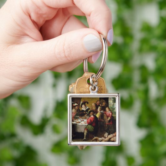 De parabel van het rijke Man en Lazarus Sleutelhanger (Hand)