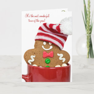 De peperkoekman van Kerstmis in hete cacao Feestdagen Kaart