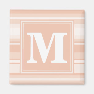 De perzikstrepen van het monogram magneet