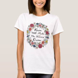 De regen zal de bloemen laten groeien t-shirt