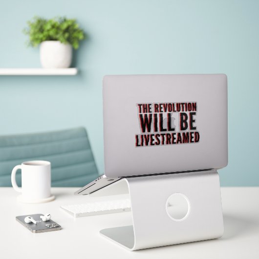 De revolutie zal overleven sticker (Laptop op bureau)