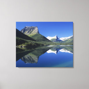 De Rocky Mountains weerspiegeld op Saint Mary Lake Canvas Afdruk