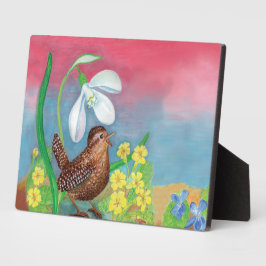 De sneeuwval en de kruivogel roepen de lente op fotoplaat