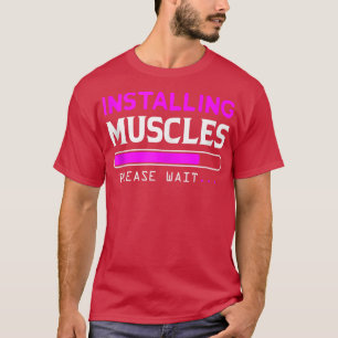 De spieren laden Een ogenblik geduld T-shirt