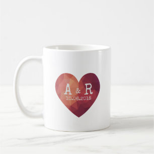 De Valentijnse rode initialen van het hartpaar Koffiemok