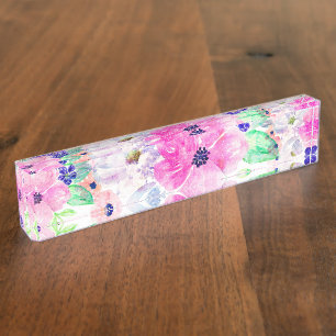 De verfontwerp van de mooie waterverf bloemenhand naambordje