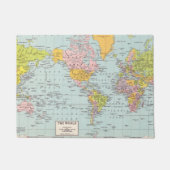 De wereld staat aan je deur deurmat (Voorkant)