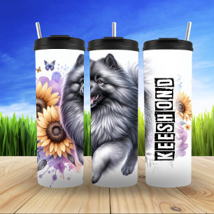 De zonnige houding van Keeshond Thermosbeker