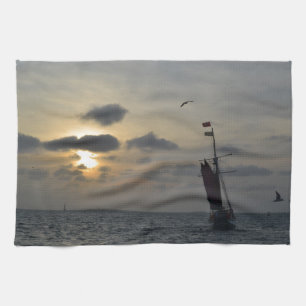 De zonsondergang binnenvaren theedoek