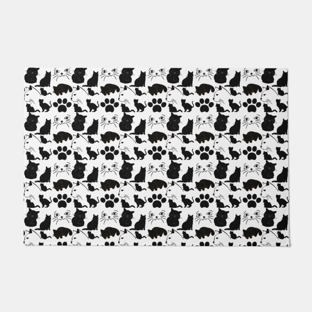 DE ZWARTE VANGSTPATRONEN DEURMAT (Voorkant)