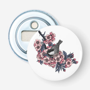 Décapsuleur Poulet sur une branche de cerise en fleurs