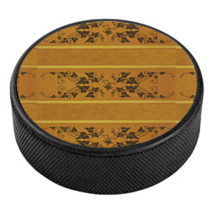 Decoratieve bloemengouden streep rand bruin hockey puck