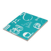 Decoratieve brieven over blauwe achtergrond tegeltje (Zijkant)