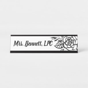 Decoratieve schoolbegeleider bloemen bureau naambordje