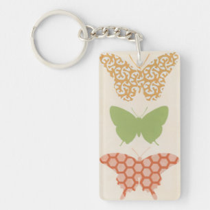 Decoratieve vlinderpatronen op de achtergrond van  sleutelhanger