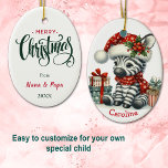 Décoration En Céramique Bébé du Père Noël Zebra Noël<br><div class="desc">Sur le devant de ce joli ornement de Noël pour enfants est un adorable bébé zèbre assis à côté de ses cadeaux. Il porte un chapeau de Père Noël motif rouge et blanc et un foulard assorti. Votre nom personnalisé est en bas. Le dos de l'ornement a un joyeux message...</div>