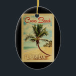Décoration En Céramique Cocoa Beach Palm Tree Vintage voyage<br><div class="desc">Un design moderne unique rétro du milieu du siècle Cocoa Beach Floride imprimé d'art dans le style d'affiche de voyage vintage. Il dispose d'un palmier incurvé sur une plage de sable avec l'océan sous un ciel bleu nuageux.</div>