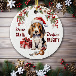 Décoration En Céramique Funny Basset Hound Puppy Définir Naughty Noël<br><div class="desc">Sur le devant de cet ornement de vacances est l'image d'un adorable chiot de Basset Hound portant un casquette du Père Noël rouge et blanc. Il est assis avec un ornement d'arbre cassé devant lui. Le texte en rouge dit "Cher PÈRE NOËL, définissez-vous NAUGHTY". Au verso, le texte rouge et...</div>