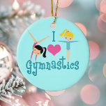 Décoration En Céramique I Love Gymnastique<br><div class="desc">J'Aime La Gymnastique. Un joli cadeau de fille de gymnastique avec adorable texte turquoise entre deux petites filles mignonnes et un beau coeur rose. Un joli cadeau de gymnastique pour un entraîneur de gymnastique pour enfants ou femmes. Une brune dans un poignet et une fille blonde aux bras tendus.</div>