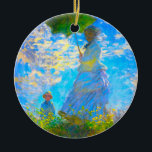 Décoration En Céramique Monet Woman avec un parasol<br><div class="desc">Un ornement avec Camille,  la femme de Claude Monet,  tenant un parasol,  et Jean,  leur fils,  se promenant dans un champ vert vif soufflé par le vent pendant une journée d’été. Un grand cadeau Monet pour les amateurs d'impressionnisme et d'art français.</div>