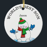 Décoration En Céramique Noël du meilleur fils de neige du monde<br><div class="desc">L'ornement en céramique de Noël du meilleur fils du monde avec l'année derrière.  Ce design ornemental a un bonhomme de neige mignon sur un arrière - plan de flocon bleu.    Changez le texte en fille,  petit fils,  neveu,  oncle,  femme ou toute personne spéciale dans votre vie.</div>