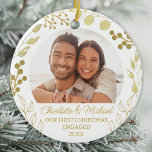Décoration En Céramique Our First Christmas Engaged Gold Foliage Photo<br><div class="desc">This elegant Engagement Christmas Ornament is decorated with gold foliage on a white background.
Easily customizable with your photo,  names,  and year.
Original Watercolor © Michele Davies.</div>