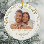 Décoration En Céramique Our First Christmas Engaged Gold Foliage Photo<br><div class="desc">This elegant Engagement Christmas Ornament is decorated with gold foliage on a white background.
Easily customizable with your photo and year.
Original Watercolor © Michele Davies.</div>