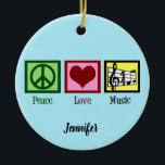 Décoration En Céramique Peace Love Musique Custom Christmas<br><div class="desc">Joli ornement de Noël musicien personnalisé avec un signe de paix,  le coeur,  une clef et un personnel musical. Cadeau cool PEACE LOVE MUSIC pour un compositeur,  un professeur de musique,  un directeur de groupe ou un chef de choeur à donner à leurs étudiants en musique.</div>