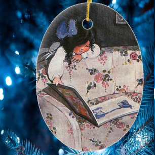 Décoration En Céramique Petite fille lisant sur le canapé