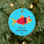 Décoration En Céramique Poisson d'or Père Noël Poisson de Noël animal<br><div class="desc">Un ornement de Noël amusant avec un poisson rouge en tenue Père Noël. L'ornement a les mots "Joyeux Noël" et une année personnalisable. Poisson d'or Père Noël Poisson Animaux de Noël Céramique Ornement Conception | ©Melissa Patton - Artiste/Illustrateur</div>