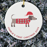 Décoration En Céramique Premier chien de Noël personnalisé<br><div class="desc">Mignonne et adorable Dachshund Sausage ou chien Wiener dans un pull tricoté festif et chapeau de Noël rouge. Modifiez le nom,  la date et le texte à personnaliser. Art original de Nic Squirrell.</div>