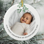 Décoration En Céramique Premier Noël En Grand-Parents Photo Mistletoe<br><div class="desc">Le premier ornement de Noël de ce grand-parent est décoré d'un tatouage à l'aquarelle. Facilement personnalisable avec la photo, le nom et l'année de votre bébé. Utilisez l'outil de conception pour modifier la taille, le style ou la couleur du texte. Parce que nous créons notre oeuvre, vous ne trouverez pas...</div>
