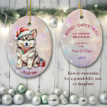 Décoration En Céramique Santa Hat Husky Puppy Grandson<br><div class="desc">Voici un bel ornement de gardien pour ce petit-fils, fils, petite-fille ou fille très spécial. Le devant est représenté par un adorable chien de chiot Husky portant un chapeau de Père Noël et un collier d'ornement. Un emballage cadeau bien emballé est à côté de lui. L'image est placée sur un...</div>
