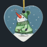 Décoration En Céramique Snowman avec Flocon de neige sur le nez<br><div class="desc">Snowman attrape un flocon de neige sur son nez ! Design original par Christie Black de Creations from the Heart.</div>