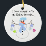 Décoration En Céramique Snowman avec un drôle de commentaire<br><div class="desc">Un mignon bonhomme de neige aux bras de brindilles tenant des flocons de neige colorés...  dit "J'adore être pendu" avec mes amis flakey"... </div>