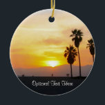 Décoration En Céramique Venice Beach California Sunset Souvenir Céramique<br><div class="desc">Cette image photographique montre de grands palmiers en silhouette debout contre un magnifique coucher de soleil jaune, doré, orange et rouge sur l'océan Pacifique à Venice Beach, Californie. Ajoutez du texte en option ou vos dates de vacances pour un souvenir unique. Autre design exclusif original par Sonja Quidama Image Code...</div>