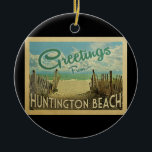 Décoration En Céramique Vintage voyage de Huntington Beach<br><div class="desc">Ce design de carte postale vintage de Salutations From Huntington Beach dispose d'une plage de sable avec une belle eau turquoise de l'océan et au-dessus de la mer,  un ciel bleu avec des nuages blancs lustrés. Dans un style de voyage vintage.</div>