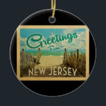Décoration En Céramique Vintage voyage de l'ornement du New Jersey Beach<br><div class="desc">Ce design de carte postale vintage du New Jersey présente une plage de sable avec une belle eau turquoise de l'océan et au-dessus de la mer,  un ciel bleu avec des nuages blancs lustrés. Dans un style de voyage vintage.</div>